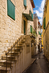 Historic residential buildings in a quiet back street in the city of Split in Croatia