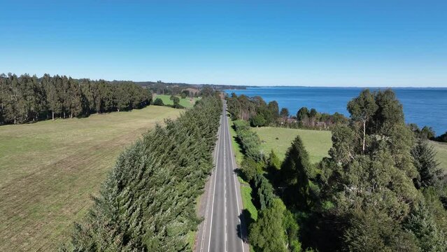 Patagonia Road At Porto Octay In Los Lagos Chile. Volcano Landscape. Sky Clouds Background. Los Lagos Chile. Road Trip Mountain. Patagonia Road At Porto Octay In Los Lagos Chile.