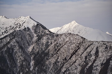 Russia. North-Eastern Caucasus. The inaccessible slopes of the eternally snow-covered high-altitude...