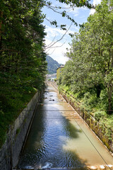 Obraz premium Aragon River as it passes through the old Canfranc station with the Pyrenees in the background.