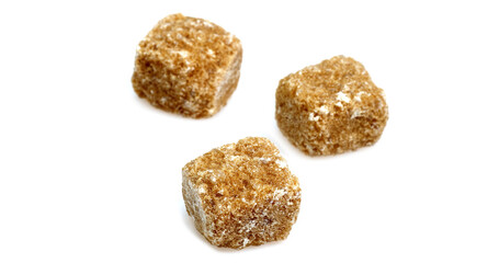 Brown Cube Sugar against White Background