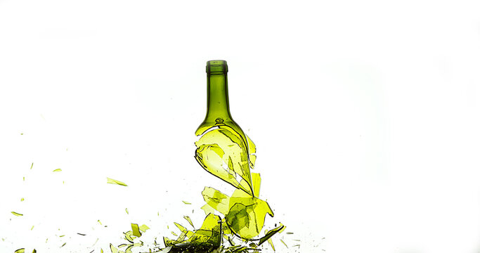 Bottle of White Wine Breaking and Splashing against White Background