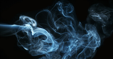 Smoke of Cigarette rising against Black Background