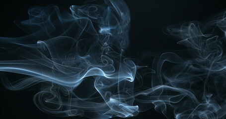 Obraz premium Smoke of Cigarette rising against Black Background
