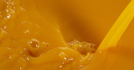 Orange Juice being poured