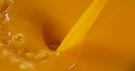 Orange Juice being poured