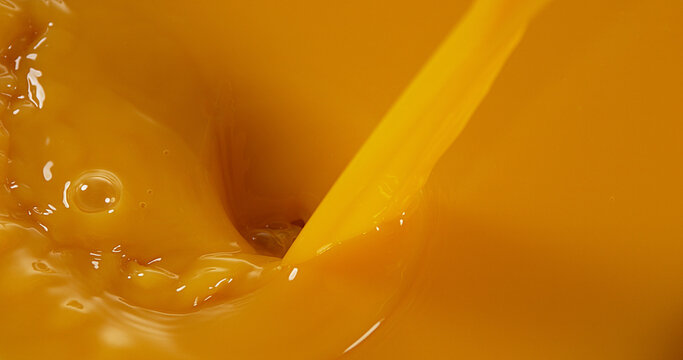Orange Juice being poured