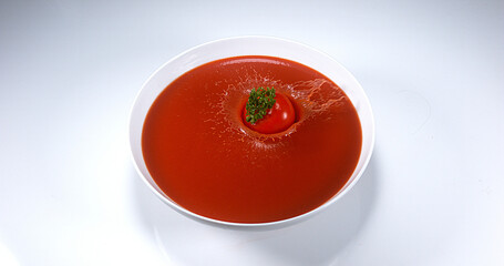 Cherry Tomatoe, solanum lycopersicum, Fruit falling into tomatoe's Juice