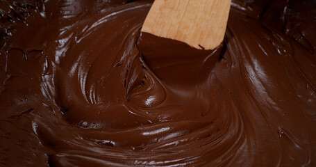 Wooden Spoon Turning Milk Chocolate
