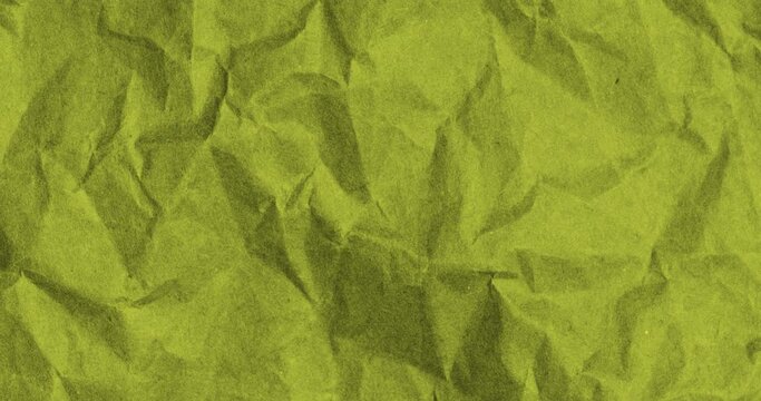 Yellow crumpled paper texture. Stop Motion. Seamless Looped. Grunge Paper Texture Noise Animated Stop Motion Background and Overlays.