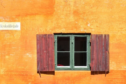 Old orange house of Nyboder district in Copenhagen, Denmark