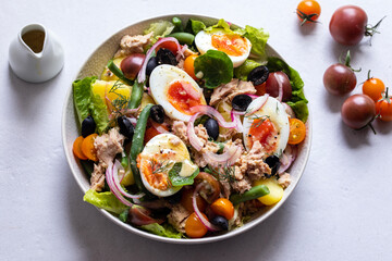Salad nicoise with boiled eggs and tuna