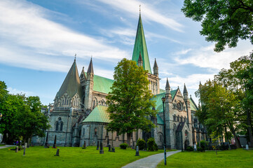 Stone cathedral with green towers in the city of Trondheim in Norway.