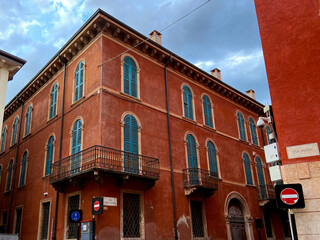 red house in the old city of Verona