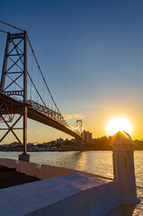 sunset over the bridge  Hercílio light from Florianopolis Santa Catarina Brazil Florianópolis part of Fort Santana do Estreito