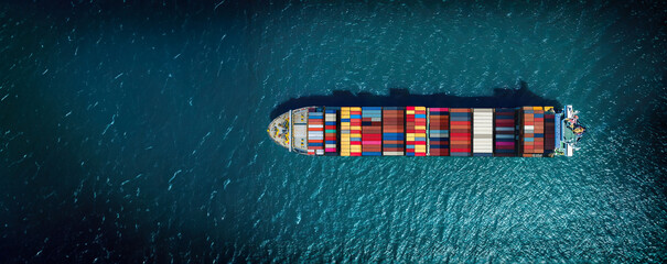 Industrial import-export port prepare to load containers. Aerial top view container ship in export...