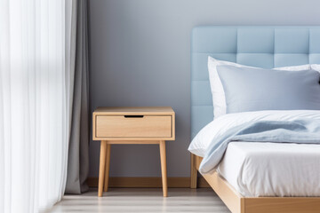 Bedroom interior with a stylish nightstand next to bed. Minimalist and elegant design. 