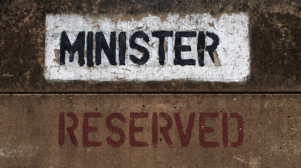 Reserved minister sign on slab concrete paint texture wall paint