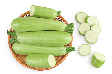 zucchini or marrow in a wicker basket isolated on white background with full depth of field. Top view. Flat lay