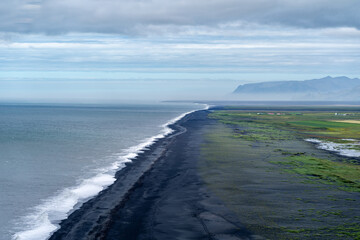 Aerial view of black sand beach near Vik as seen from Dyrholaey Iceland