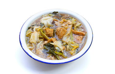 Mixed vegetable stew with tofu in white bowl (Tom Jub Chai)