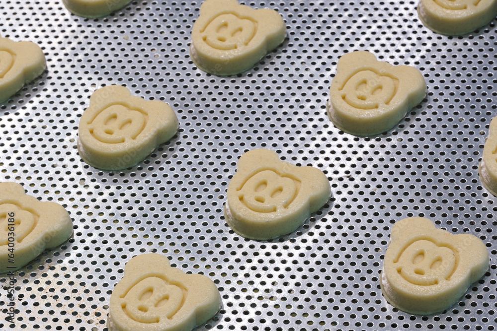Poster sweets factory. sweets production process. conveyor belt with sweets on it.