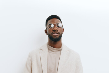 Fototapeta premium portrait man glasses african american jacket black beige fashion stylish style model
