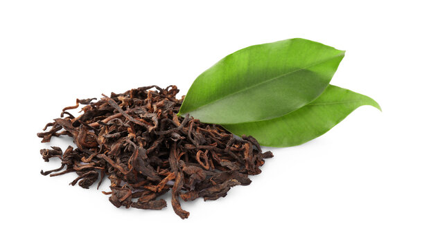Pile of Traditional Chinese pu-erh tea and fresh leaves isolated on white