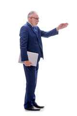 Old businessman with computer isolated on white