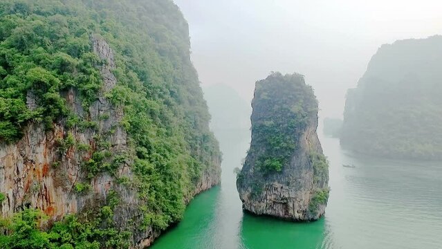 Aerial view amazing Panak island has a cave entrance into the canyon. .Visitors can take a canoe boat to see the big mangrove up in the valley..Panak island is the one landmark of Phang Nga Thailand