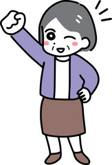 笑顔でガッツポーズをしている私服のシニア女性(全身)