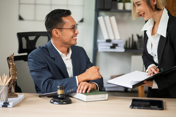 Judge gavel with Justice lawyers having team Concepts of Law and Legal services