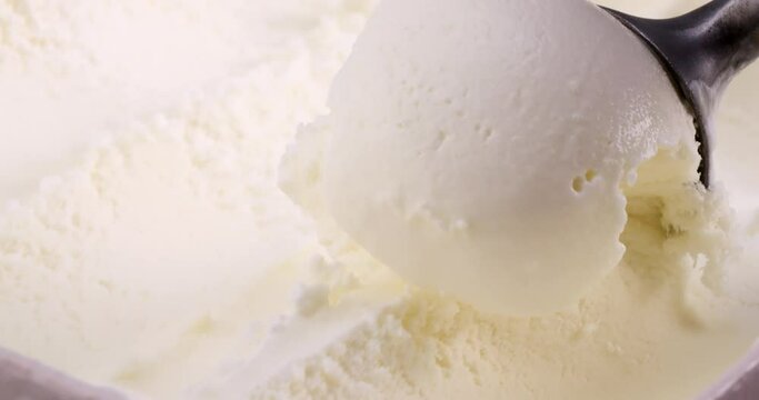 4K footage Front view, Scoop fresh coconut milk ice cream.