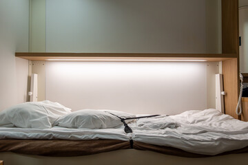 Helsinki, Finland  A single made-up fold-up bed in a cabin aboard a ferry between Sweden and...
