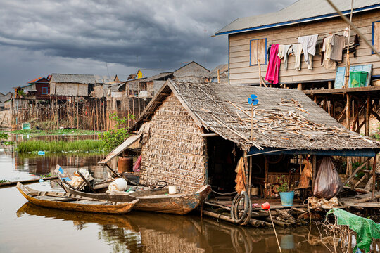 Poor Cambodians living in poverty along a river