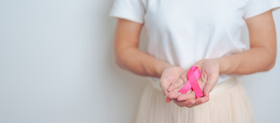 Pink October Breast Cancer Awareness month, woman with pink Ribbon in hospital for support people life and illness. National cancer survivors month, Mother and World cancer day concept