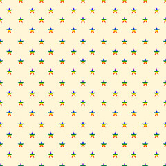 seamless pattern of rainbow star on yellow background