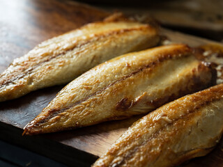 Grilled mackerel on cutting board