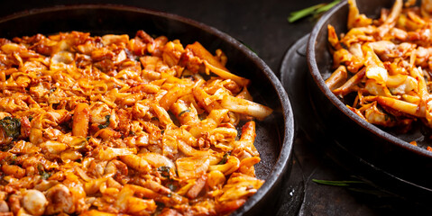 Spicy chicken ribs on an iron plate