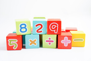 Number wood block cubes for learning Mathematic, education math concept.