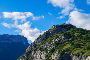 Scenic view of ruins on a hill near the Bastille Fortress. 19th century military fortress overlooking the city of Grenoble, Auvergne-Rhone-Alps, France, Europe. Mountain Troops Memorial on Mont Jalla