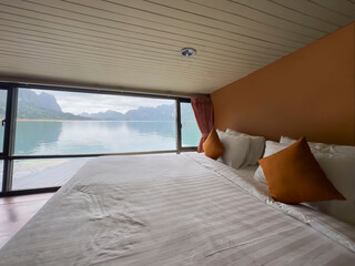 Window view with white pillow decoration of  cozy interior room 