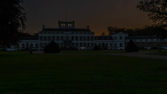 Stunning time lapse of Paleis Soestdijk while the sun rises. The palace used to be the residence of the royal family. The camera pans from right to left