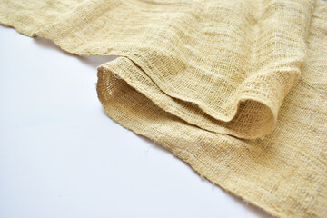 Fototapeta na wymiar torn sackcloth isolated on white background, burlap fabric texture for design