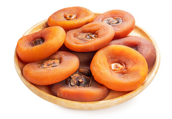 Dried persimmon in wooden plate on white background, Dried persimmon on a wooden plate isolate on white with clipping path.