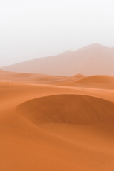 Fototapeta na wymiar Sahara Desert Textures on a cloudy day in Merzouga, Morocco