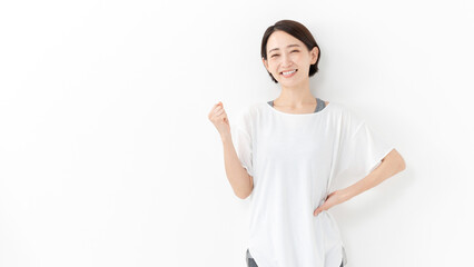 Fototapeta premium ガッツポーズする女性 フィットネス