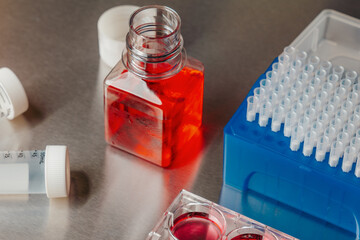 Cell culture media in laboratory for pipet.