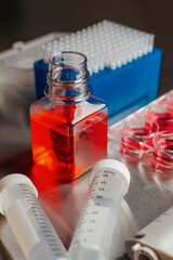 Cell culture media in laboratory for pipet.