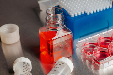 Cell culture media in laboratory for pipet.